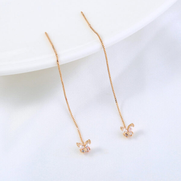 Shop Stunning Gold Butterfly Copper Zircon Tassel Pendant Earrings - Elevate Your Style! - Image 4
